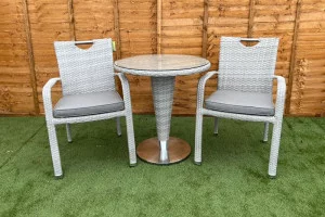 Sharnford Stacking Rattan Bistro Set in Latte Sharnford Stacking Rattan Bistro Set in Latte