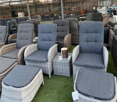 reclining rattan bistro set in showroom